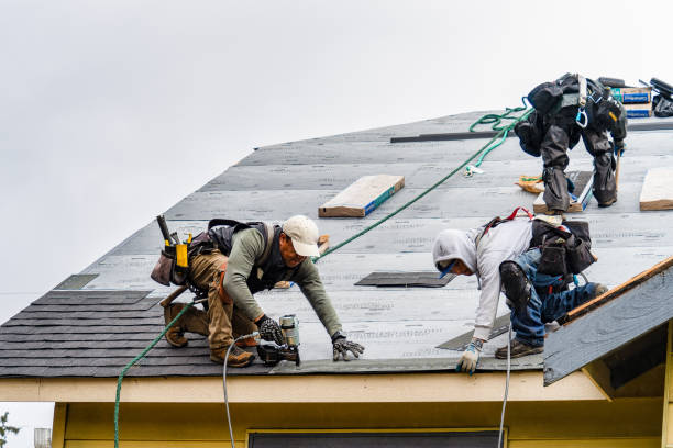 Professional Flat Roof Repair technician working in Chandler, OK